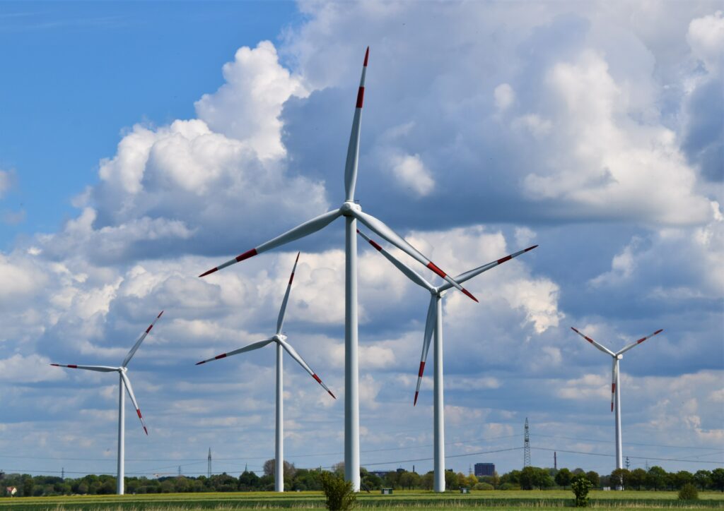 Windmills on a farmer's fields.