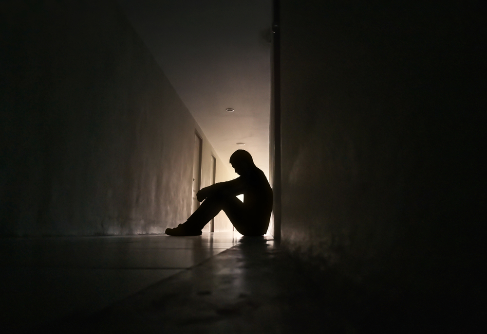 Silhouette of a depressed person