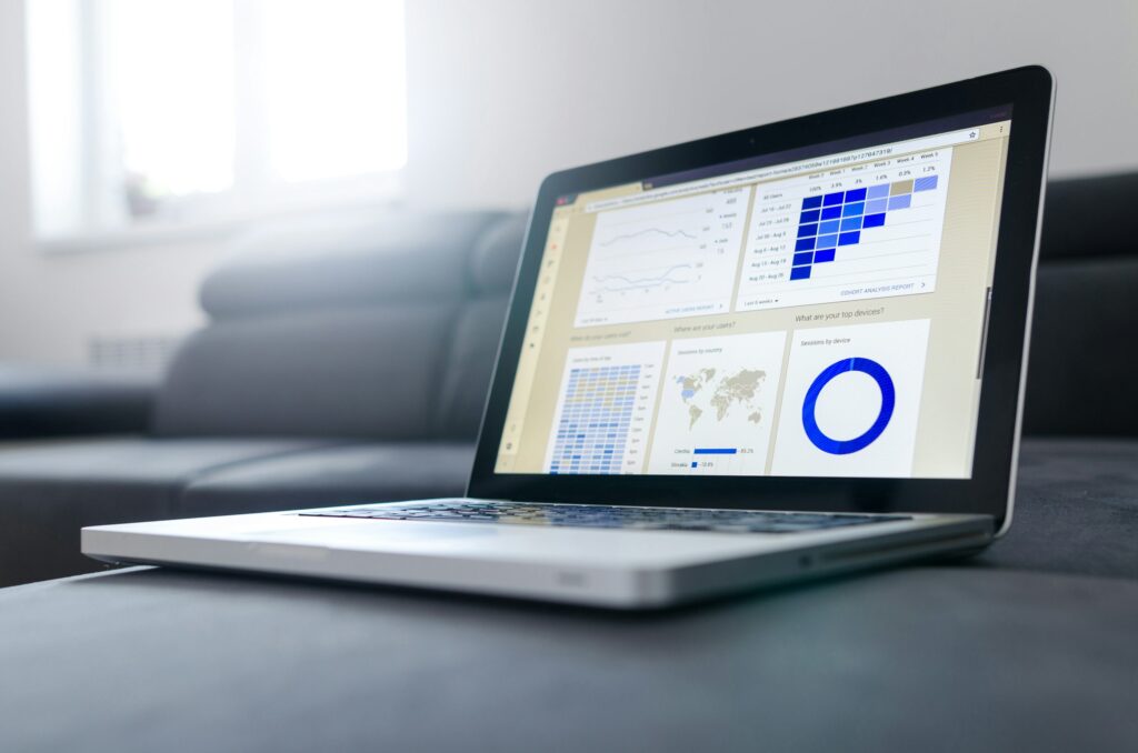 Laptop with graphs and charts open